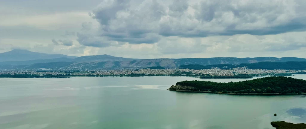 Nature picture: lake view with an island in the middle.