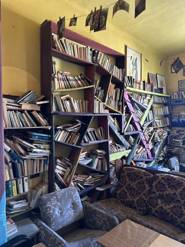 Csinos Presszó's wall was full of crazy looking bookshelves.