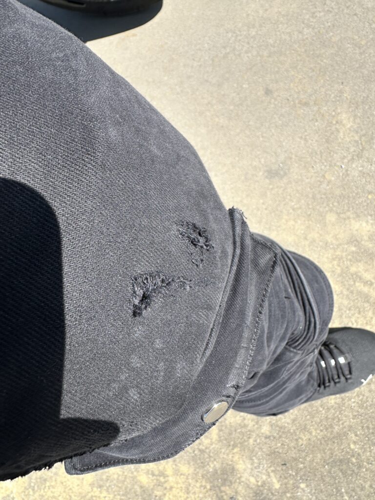 Whole on Rag's trousers after a fall with a motorbike.