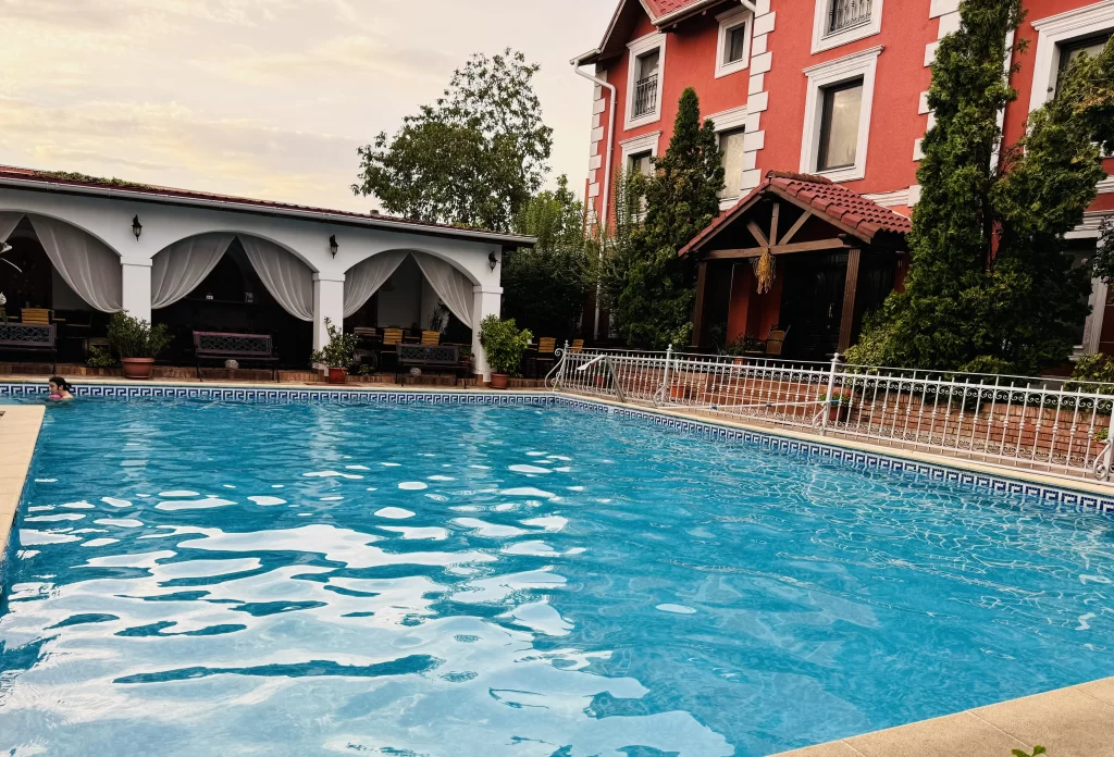 A poolside view of theBoutique Casa del Sole, our first Romanian accommodation with friends