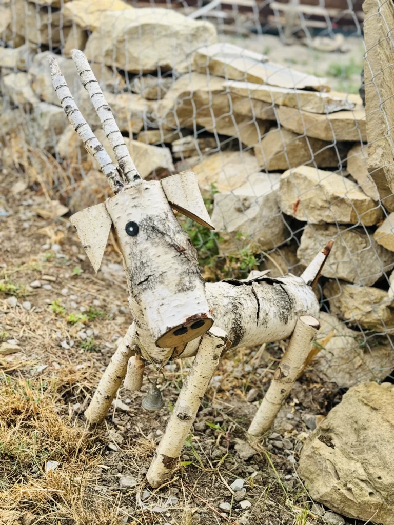 A wooden goat at the Serendipity Cottage in Bulgaria