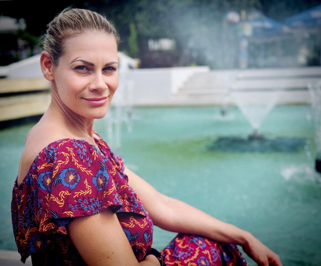 Sophie sitting at the fountains in Popovo Bulgaria.